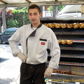 This young man does roast chicken